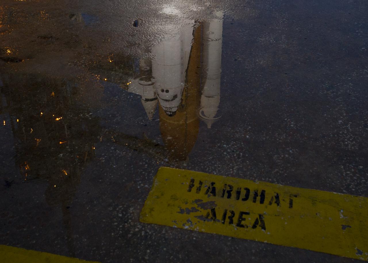 The space shuttle Atlantis is seen shortly after the rotating service structure (RSS) was rolled back at launch pad 39a, Thursday, July 7, 2011 at the NASA Kennedy Space Center in Cape Canaveral, Fla. Atlantis is set to liftoff Friday, July 8, on the final flight of the shuttle program, STS-135, a 12-day mission to the International Space Station. Photo Credit: (NASA/Bill Ingalls)