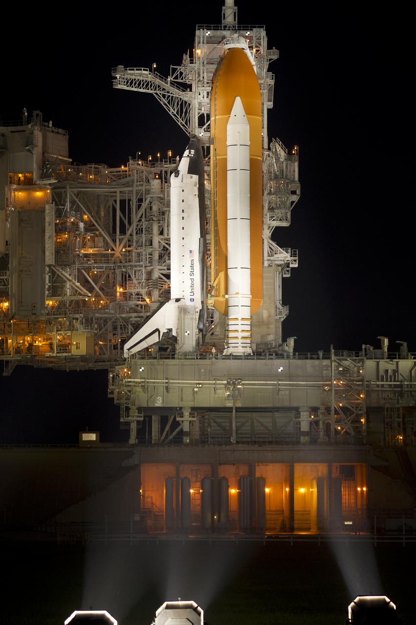 The space shuttle Atlantis is seen shortly after the rotating service structure (RSS) was rolled back at launch pad 39a, Thursday, July 7, 2011 at the NASA Kennedy Space Center in Cape Canaveral, Fla.  Atlantis is set to liftoff Friday, July 8, on the final flight of the shuttle program, STS-135, a 12-day mission to the International Space Station.  Photo Credit: (NASA/Bill Ingalls)