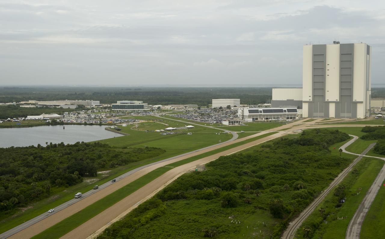 The Astrovan carrying the STS-135 crew; Chris Furgeson, commander, Doug Hurley, pilot, and mission specialists Rex Walheim and Sandy Mangus, rolls toward launch pad 39a and space shuttle Atlantis, Friday, July 8, 2011, at Kennedy Space Center in Cape Canaveral, Fla. The launch of Atlantis, STS-135, is the final flight of the shuttle program, a 12-day mission to the International Space Station.  Photo Credit: (NASA/Bill Ingalls)