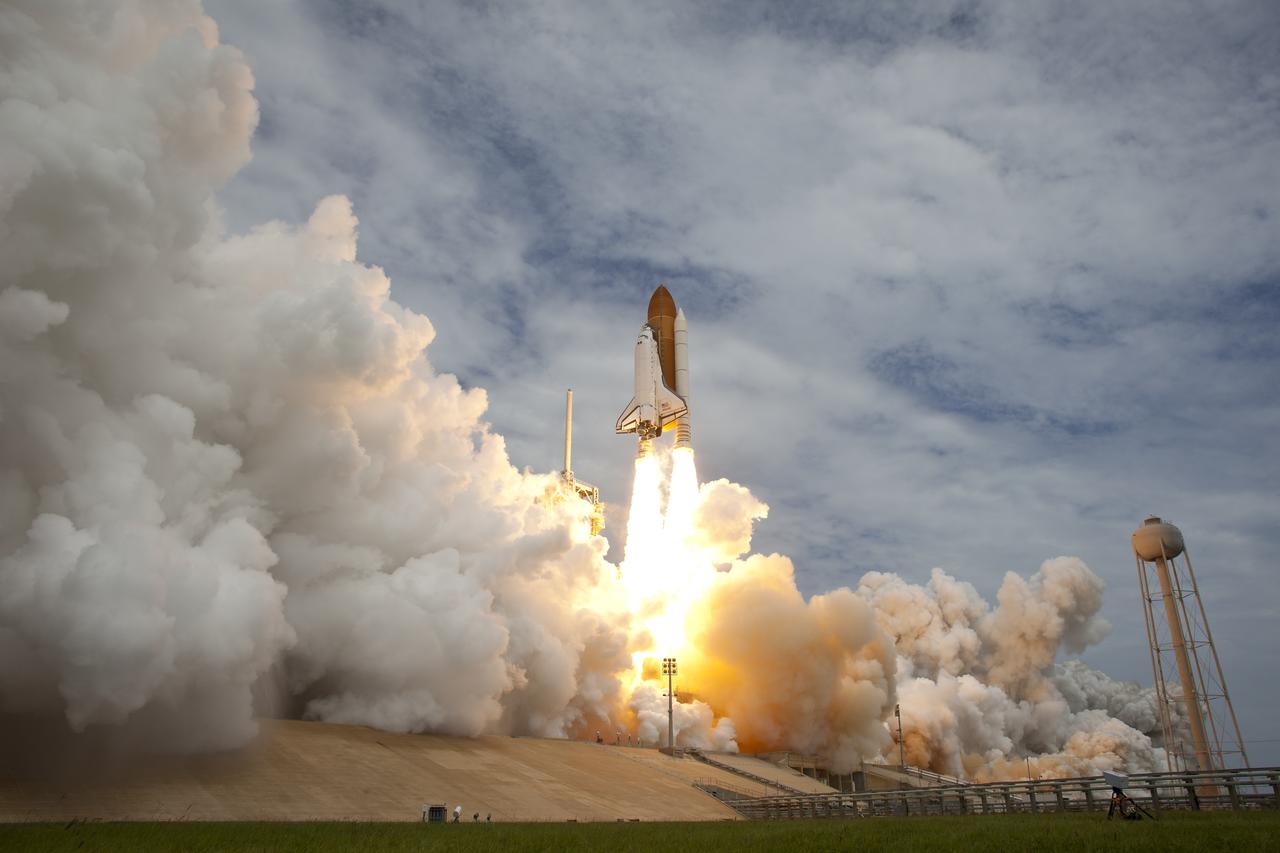 Space shuttle Atlantis is seen as it launches from pad 39A on Friday, July 8, 2011, at NASA's Kennedy Space Center in Cape Canaveral, Fla. The launch of Atlantis, STS-135, is the final flight of the shuttle program, a 12-day mission to the International Space Station. Photo Credit: (NASA/Bill Ingalls)