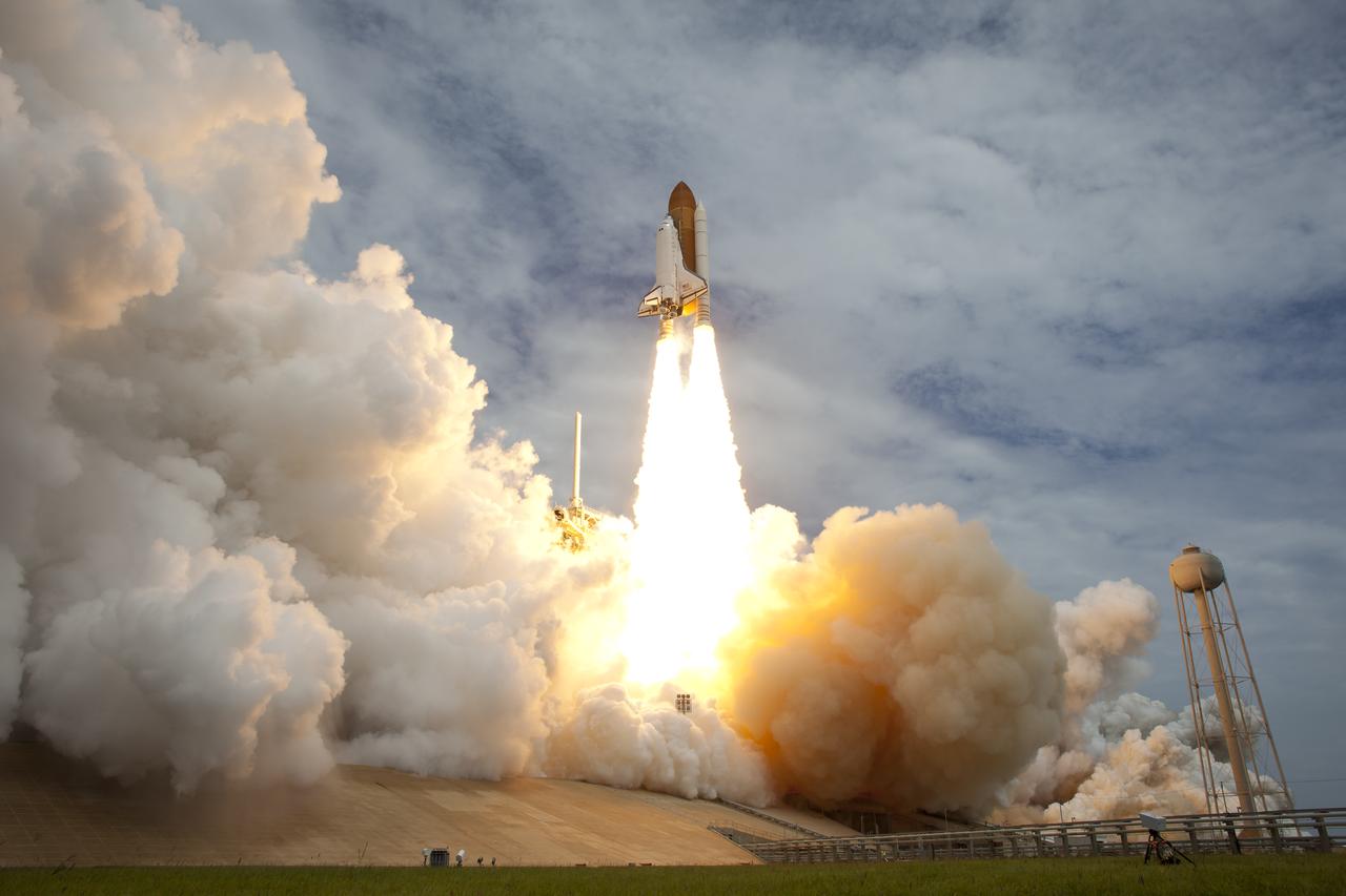 Space shuttle Atlantis is seen as it launches from pad 39A on Friday, July 8, 2011, at NASA's Kennedy Space Center in Cape Canaveral, Fla. The launch of Atlantis, STS-135, is the final flight of the shuttle program, a 12-day mission to the International Space Station. Photo Credit: (NASA/Bill Ingalls)