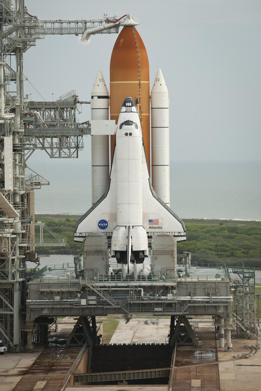 Space shuttle Atlantis is seen on launch pad 39a moments after the STS-135 crew arrived for their launch, Friday, July 8, 2011, at the NASA Kennedy Space Center in Cape Canaveral, Fla. The launch of Atlantis, STS-135, is the final flight of the shuttle program, a 12-day mission to the International Space Station.  Photo Credit: (NASA/Bill Ingalls)