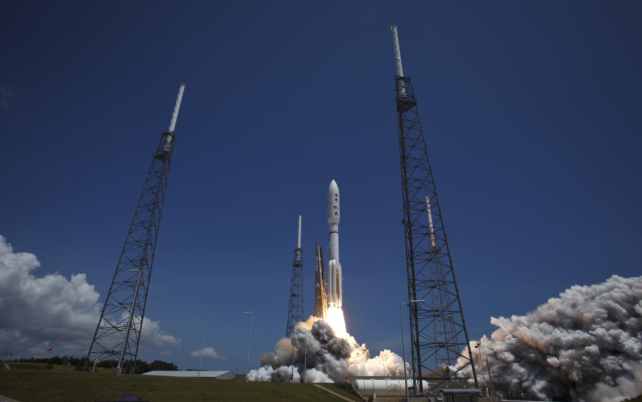 An Atlas V rocket launches with the Juno spacecraft payload from Space Launch Complex 41 at Cape Canaveral Air Force Station in Florida on Friday, August 5, 2011. The Juno spacecraft will make a five-year, 400-million-mile voyage to Jupiter, orbit the planet, investigate its origin and evolution with eight instruments to probe its internal structure and gravity field, measure water and ammonia in its atmosphere, map its powerful magnetic field and observe its intense auroras. Photo Credit: (NASA/Bill Ingalls)