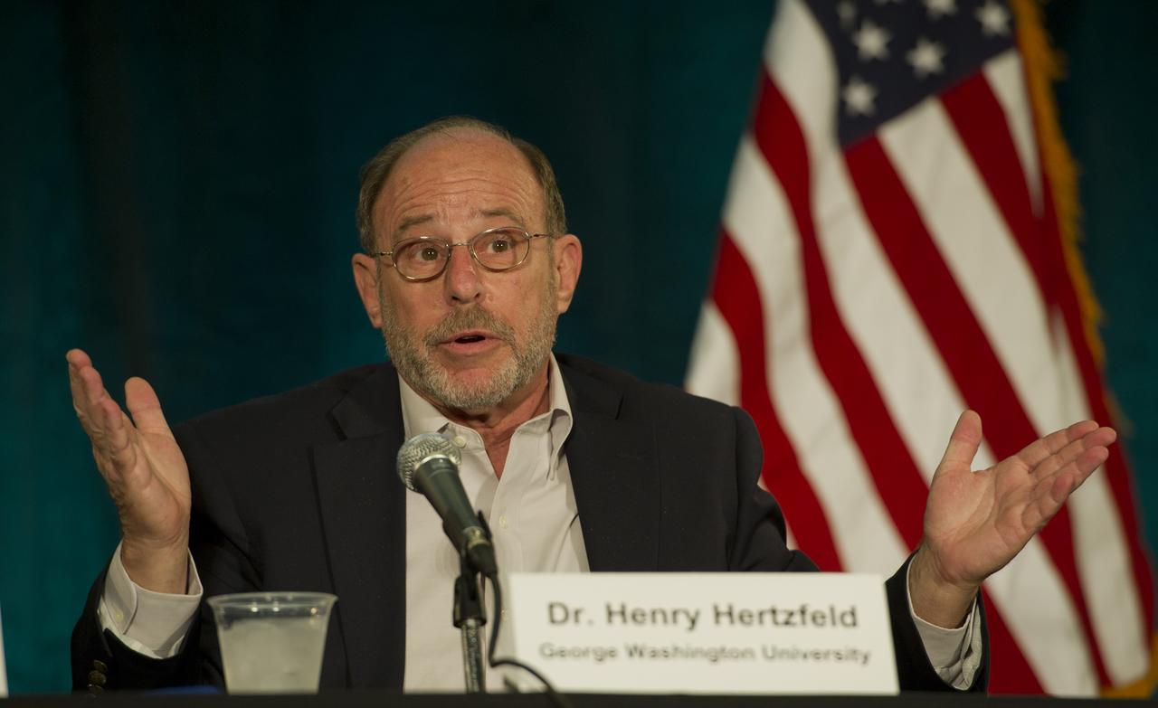 Dr. Henry Hertzfeld, from George Washington University, speaks about technology investments and their benefits during a panel discussion at the 2011 NASA Future Forum held at the Riggs Alumni Center on the campus of the University of Maryland, Thursday, Aug. 11, 2011, in College Park, Md. Photo Credit: (NASA/Paul E. Alers)