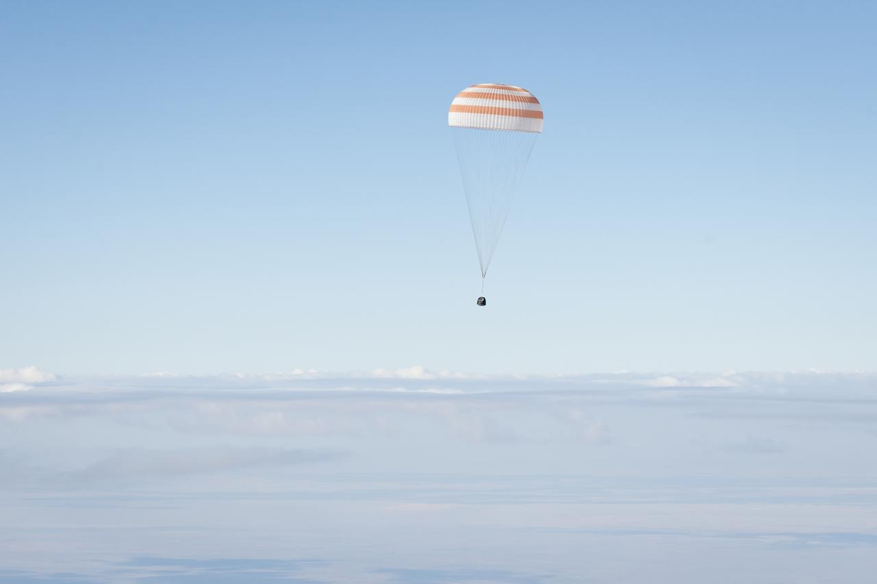 The Soyuz TMA-21 spacecraft is seen as it lands with Expedition 28 Commander Andrey Borisenko, and Flight Engineers Ron Garan, and Alexander Samokutyaev in a remote area outside of the town of Zhezkazgan, Kazakhstan, on Friday, Sept. 16, 2011. NASA Astronaut Garan, Russian Cosmonauts Borisenko and Samokutyaev are returning from more than five months onboard the International Space Station where they served as members of the Expedition 27 and 28 crews. Photo Credit: (NASA/Bill Ingalls)