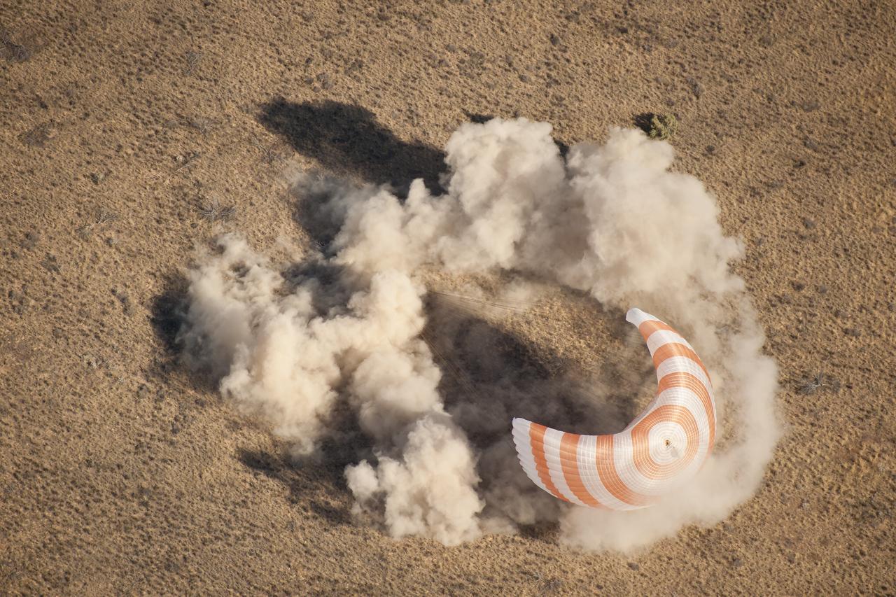 The Soyuz TMA-21 spacecraft is seen as it lands with Expedition 28 Commander Andrey Borisenko, and Flight Engineers Ron Garan, and Alexander Samokutyaev in a remote area outside of the town of Zhezkazgan, Kazakhstan, on Friday, Sept. 16, 2011. NASA Astronaut Garan, Russian Cosmonauts Borisenko and Samokutyaev are returning from more than five months onboard the International Space Station where they served as members of the Expedition 27 and 28 crews. Photo Credit: (NASA/Bill Ingalls)