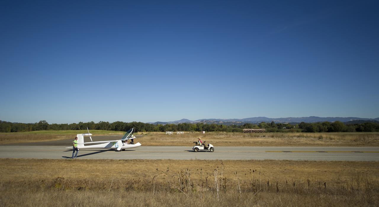 The e-Genius aircraft is pulled out to the runway for the miles per gallon (MPG) flight during the 2011 Green Flight Challenge, sponsored by Google, at the Charles M. Schulz Sonoma County Airport in Santa Rosa, Calif. on Tuesday, Sept. 27, 2011.  NASA and the Comparative Aircraft Flight Efficiency (CAFE) Foundation are having the challenge with the goal to advance technologies in fuel efficiency and reduced emissions with cleaner renewable fuels and electric aircraft. Photo Credit: (NASA/Bill Ingalls)