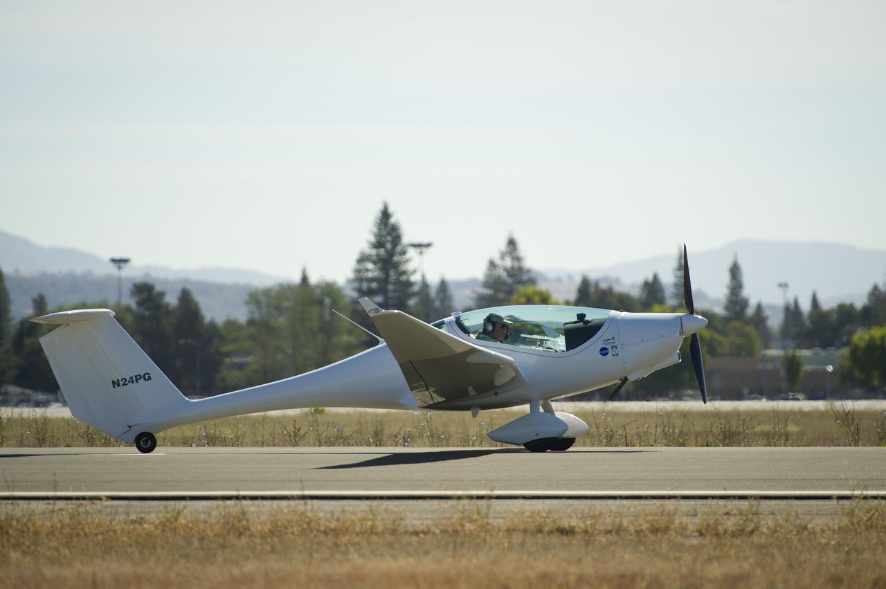 The PhoEnix aircraft prepares to takeoff for the miles per gallon (MPG) flight during the 2011 Green Flight Challenge, sponsored by Google, at the Charles M. Schulz Sonoma County Airport in Santa Rosa, Calif. on Tuesday, Sept. 27, 2011.  NASA and the Comparative Aircraft Flight Efficiency (CAFE) Foundation are having the challenge with the goal to advance technologies in fuel efficiency and reduced emissions with cleaner renewable fuels and electric aircraft. Photo Credit: (NASA/Bill Ingalls)