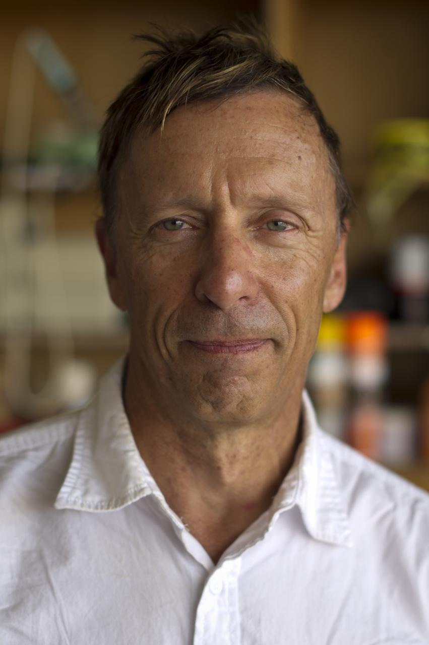 e-Genius Aircraft Pilot Eric Raymond poses for a photograph during the 2011 Green Flight Challenge, sponsored by Google, held at the Charles M. Schulz Sonoma County Airport in Santa Rosa, Calif. on Thursday, Sept. 29, 2011. NASA and the Comparative Aircraft Flight Efficiency (CAFE) Foundation are having the challenge with the goal to advance technologies in fuel efficiency and reduced emissions with cleaner renewable fuels and electric aircraft. Photo Credit: (NASA/Bill Ingalls)