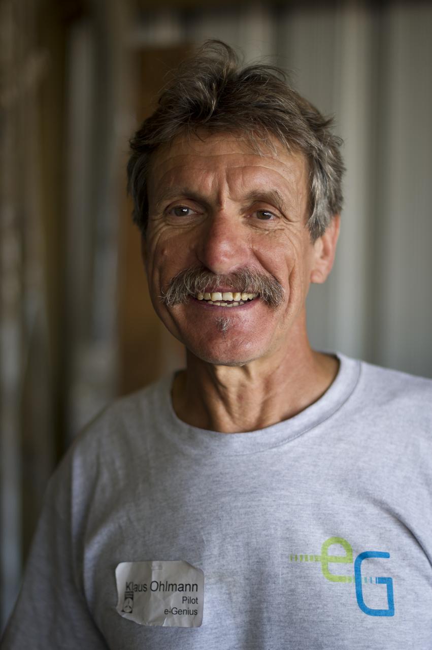 e-Genius Aircraft Pilot Klaus Ohlmann poses for a photograph during the 2011 Green Flight Challenge, sponsored by Google, held at the Charles M. Schulz Sonoma County Airport in Santa Rosa, Calif. on Thursday, Sept. 29, 2011. NASA and the Comparative Aircraft Flight Efficiency (CAFE) Foundation are having the challenge with the goal to advance technologies in fuel efficiency and reduced emissions with cleaner renewable fuels and electric aircraft. Photo Credit: (NASA/Bill Ingalls)