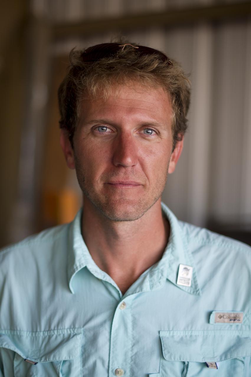 EcoEagle Aircraft Pilot Mikhael Ponso poses for a photograph during the 2011 Green Flight Challenge, sponsored by Google, held at the Charles M. Schulz Sonoma County Airport in Santa Rosa, Calif. on Thursday, Sept. 29, 2011. NASA and the Comparative Aircraft Flight Efficiency (CAFE) Foundation are having the challenge with the goal to advance technologies in fuel efficiency and reduced emissions with cleaner renewable fuels and electric aircraft. Photo Credit: (NASA/Bill Ingalls)