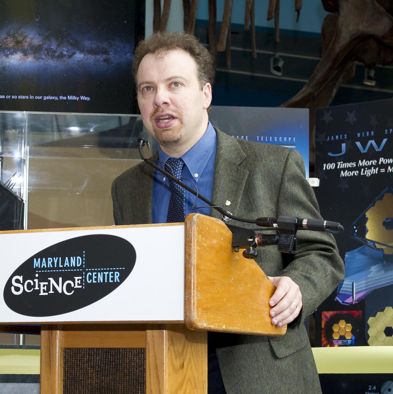 Adam Reiss, recipient of the 2011 Nobel Prize in Physics and professor of astronomy and physics at Johns Hopkins University speaks at the presentation of the permanent exhibit of the James Webb Space Telescope at the Maryland Science Center on Wednesday, Oct. 26, 2011 in Baltimore.  Photo Credit:  (NASA/Carla Cioffi)