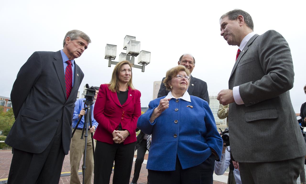 Dr. John Grunsfeld, former astronaut and Deputy Director, Space Telescope Science Institute (STScI), Baltimore, far right, speaks with U.S. Senator Barbara Mikulski about the James Webb Space Telescope at the Maryland Science Center in Baltimore on Wednesday, Oct. 26, 2011.  Looking on are Van Reiner, President and CEO of the Maryland Science Center, Baltimore, far left; NASA Deputy Administrator Lori Garver and Jeffrey Grant, VP and General Manager of the Space Systems Division, Northrop Grumman.  Photo Credit:  (NASA/Carla Cioffi)