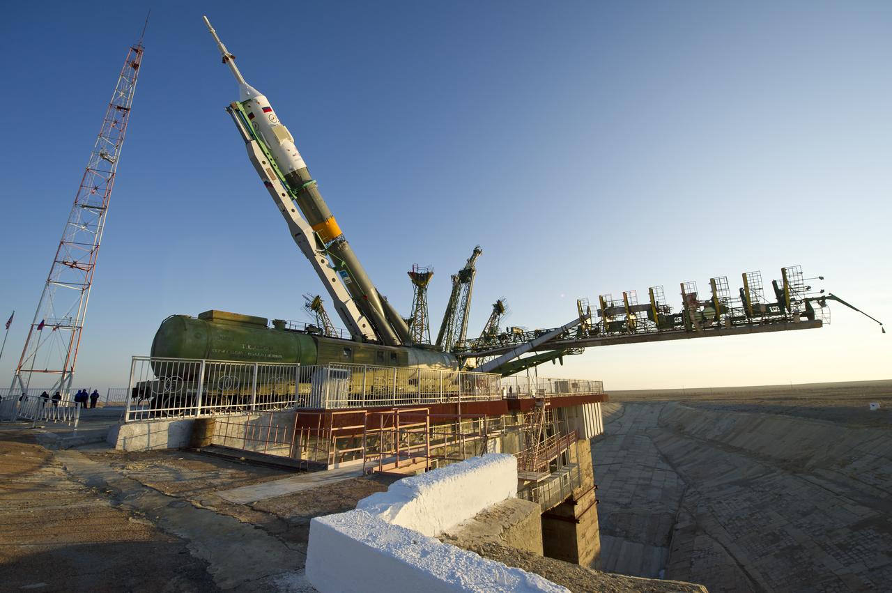 The Soyuz TMA-22 spacecraft is lifted on to the launch pad at the Baikonur Cosmodrome in Kazakhstan, Friday, Nov. 11, 2011. The rocket is being prepared for launch November 14 to carry the crew of Expedition 29 to the International Space Station.  Photo Credit:  (NASA/Carla Cioffi)
