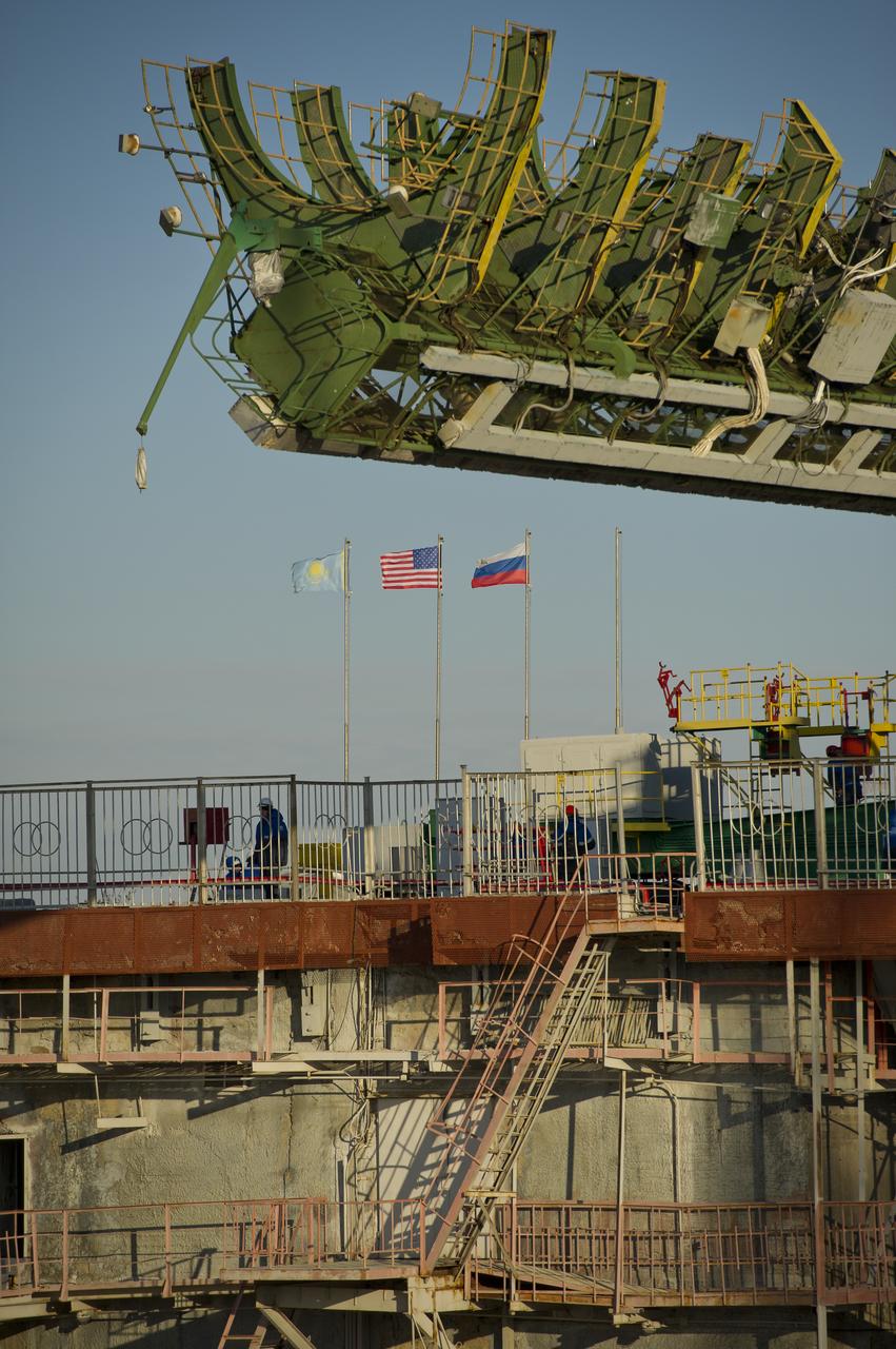 The flags representing Kazakhstan and the nations of the three crew members who will launch in the Soyuz TMA-22 spacecraft are shown at the launch pad at the Baikonur Cosmodrome in Kazakhstan on Friday, Nov. 11, 2011.   From left to right are the flags of Kazakhstan, the United States and Russia.  Scheduled to launch on November 14 local time are Expedition 29 Soyuz Commander Anton Shkaplerov of Russia, NASA Flight Engineer Dan Burbank and Russian Flight Engineer Anatoly Ivanishin. Photo Credit (NASA/Carla Cioffi)