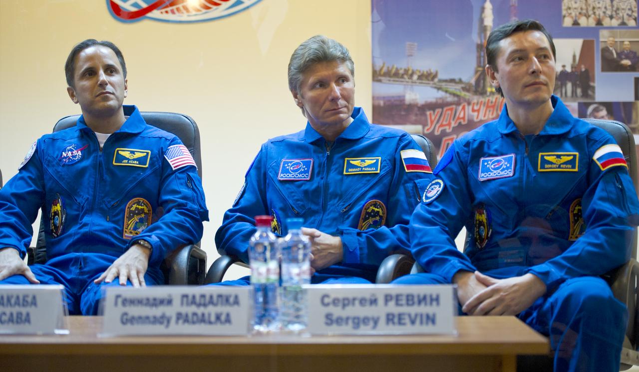 Expedition 29 backup crew members NASA Flight Engineer Joseph Acaba, far left, Russian Soyuz Commander Gennady Padalka, center, and Russian Flight Engineer Sergei Revin are seen at a press conference held at the Cosmonaut Hotel in Baikonur, Kazakhstan on Saturday, Nov. 12, 2011. Photo Credit: (NASA/Carla Cioffi)