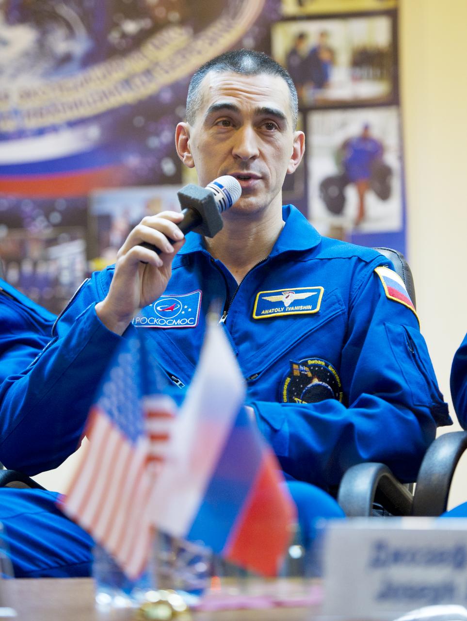 Expedition 29 Russian Flight Engineer Anatoly Ivanishin answers a reporter’s question during a press conference held at the Cosmonaut Hotel in Baikonur, Kazakhstan on Saturday, Nov. 12, 2011.  The launch of the Soyuz spacecraft with Ivanishin, Soyuz Commander Anton Shkaplerov and NASA Flight Engineer Dan Burbank is scheduled for November 14.  Photo Credit: (NASA/Carla Cioffi)