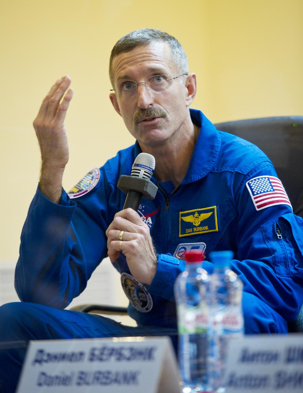 Expedition 29 NASA Flight Engineer Dan Burbank answers a reporter’s question during a press conference held at the Cosmonaut Hotel in Baikonur, Kazakhstan on Saturday, Nov. 12, 2011.  The launch of the Soyuz spacecraft with Expedition 29 NASA Flight Engineer Dan Burbank, Soyuz Commander Anton Shkaplerov and Flight Engineer Anatoly Ivanishin is scheduled for November 14.  Photo Credit: (NASA/Carla Cioffi)
