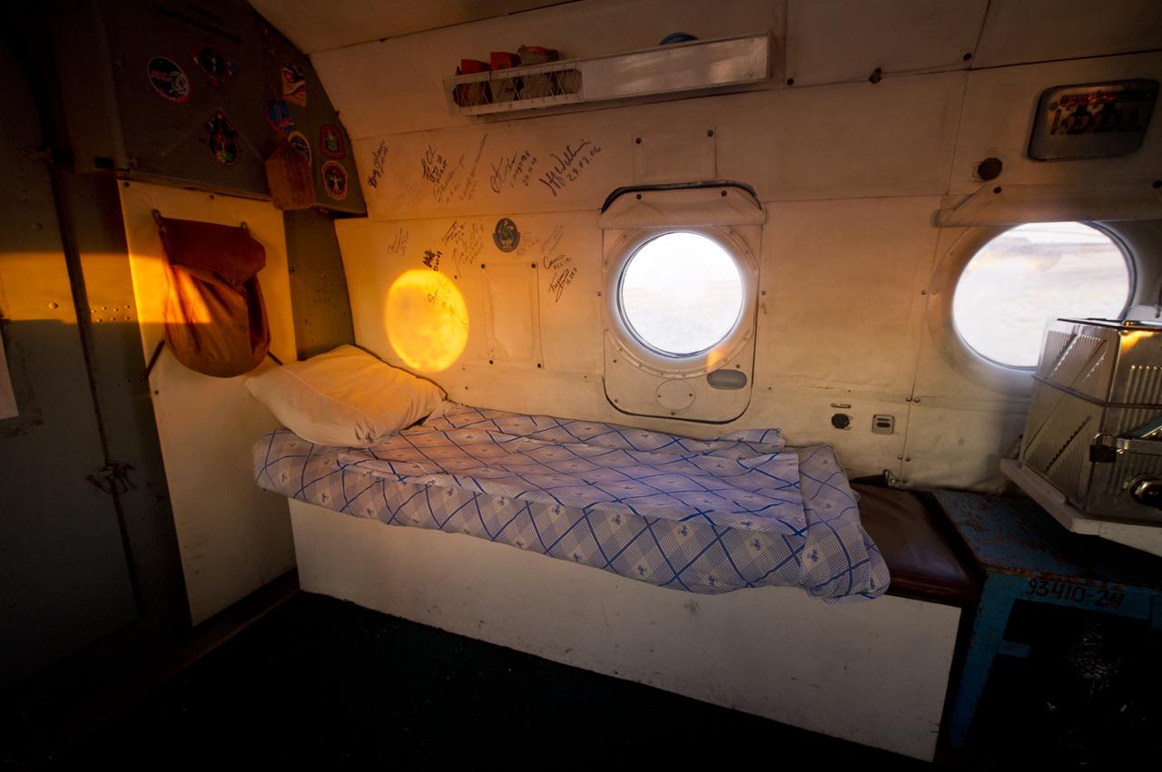 A view inside inside the Russian Search and Rescue helicopter that will carry Expedition 29 Commander Mike Fossum from the Soyuz TMA-02M landing site in a remote area outside Arkalyk, Kazakhstan to Kustanay, Kazakhstan shortly after he and Expedition 29 Flight Engineers Sergei Volkov and Satoshi Furukawa returned from the International Space Station on Tuesday, Nov. 22, 2011. NASA Astronaut Fossum, Russian Cosmonaut Volkov and JAXA (Japan Aerospace Exploration Agency) Astronaut Furukawa returned from more than five months onboard the International Space Station where they served as members of the Expedition 28 and 29 crews. The inside of the helicopter has the signatures of previous Astronauts, Cosmonauts and space tourist that have flown onboard.  Photo Credit: (NASA/Bill Ingalls)