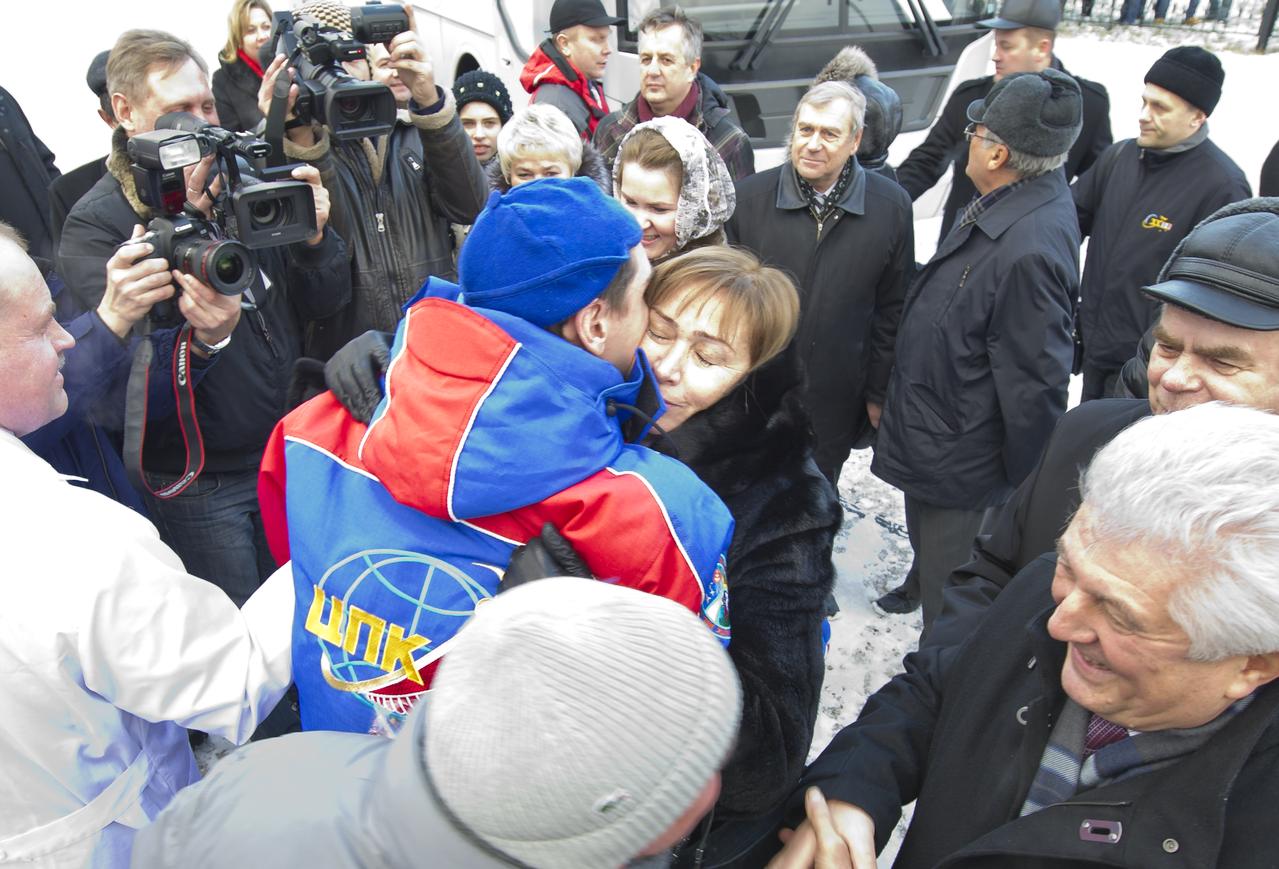 Expedition 29 Flight Engineer Sergei Volkov is welcomed home by colleagues and family in Star City, Russia on Tuesday, Nov. 22, 2011.  Russian Cosmonaut Volkov, Expedition 29 Commander Mike Fossum, and JAXA (Japan Aerospace Exploration Agency) Flight Engineer Satoshi Furukawa returned  to Arkalyk, Kazakhstan earlier in the day from over five months onboard the International Space Station where they served as members of the Expedtion 28 and 29 crews. Photo Credit: (NASA/Bill Ingalls)