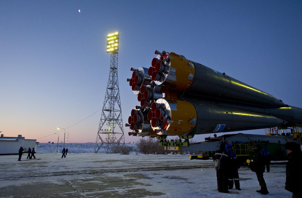 The Soyuz rocket is seen as it approaches the Soyuz launch pad on Monday, Dec. 21, 2011 at the Baikonur Cosmodrome in Kazakhstan. The launch of the Soyuz spacecraft will carry Expedition 30 Soyuz Commander Soyuz Commander Oleg Kononenko of Russia, NASA Flight Engineer Don Pettit and ESA (European Space Agency) astronaut and Flight Engineer Andre Kuipers to the International Space Station. Photo Credit (NASA/Carla Cioffi)