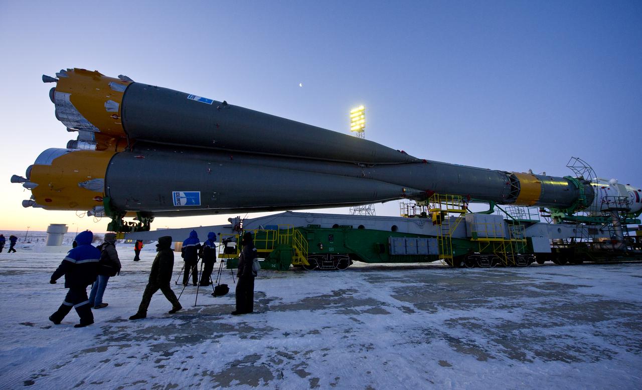 The Soyuz rocket is seen as it approaches the Soyuz launch pad on Monday, Dec. 21, 2011 at the Baikonur Cosmodrome in Kazakhstan. The launch of the Soyuz spacecraft will carry Expedition 30 Soyuz Commander Soyuz Commander Oleg Kononenko of Russia, NASA Flight Engineer Don Pettit and ESA (European Space Agency) astronaut and Flight Engineer Andre Kuipers to the International Space Station. Photo Credit (NASA/Carla Cioffi)