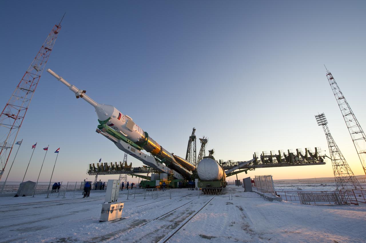 The Soyuz TMA-03M spacecraft is lifted on to the launch pad at the Baikonur Cosmodrome in Kazakhstan, Monday, Dec. 19, 2011. The rocket is being prepared for launch on December 21 to carry the crew of Expedition 30 to the International Space Station.  Photo Credit:  (NASA/Carla Cioffi)