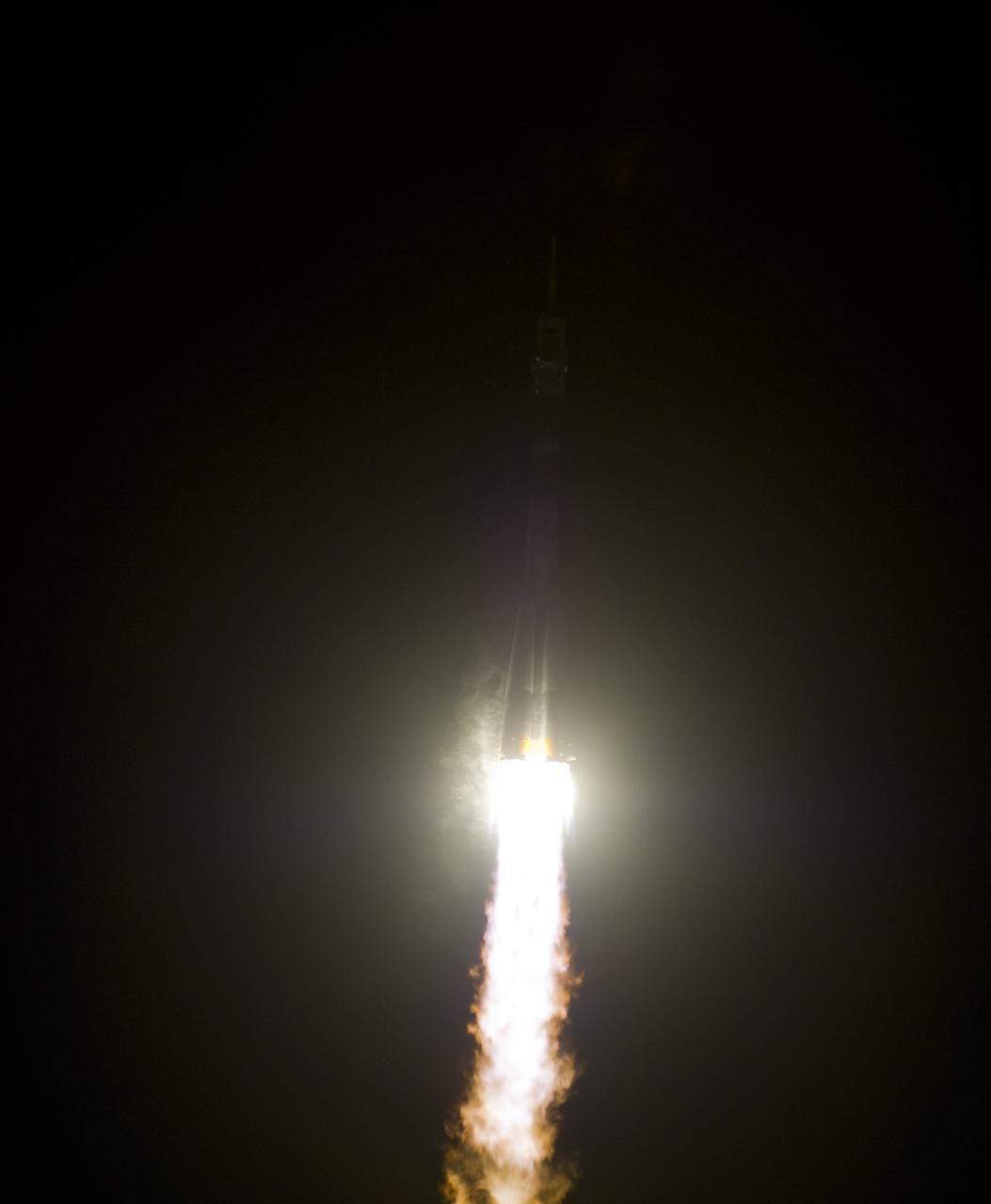 The Soyuz TMA-03M rocket launches from the Baikonur Cosmodrome in Kazakhstan on Wednesday, Dec. 21, 2011 carrying Expedition 30 Soyuz Commander Oleg Kononenko of Russia, NASA Flight Engineer Don Pettit and ESA (European Space Agency) astronaut and Flight Engineer Andre Kuipers to the International Space Station. (Photo Credit: NASA/Carla Cioffi)