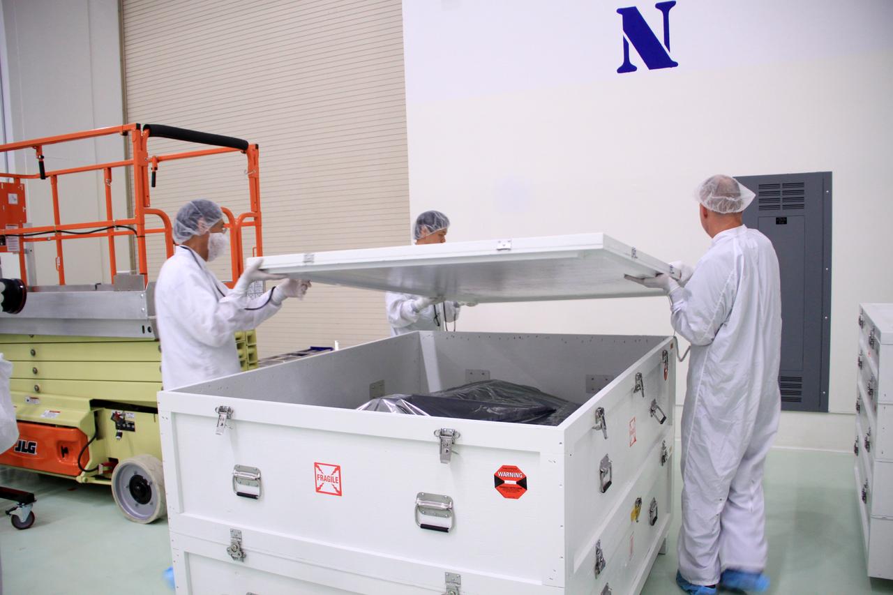 RBSP-A, Canister Removal, First Bag Removal, Solar Panels Unbagged and into Work Stand