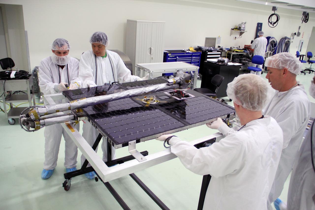 RBSP-A, Canister Removal, First Bag Removal, Solar Panels Unbagged and into Work Stand