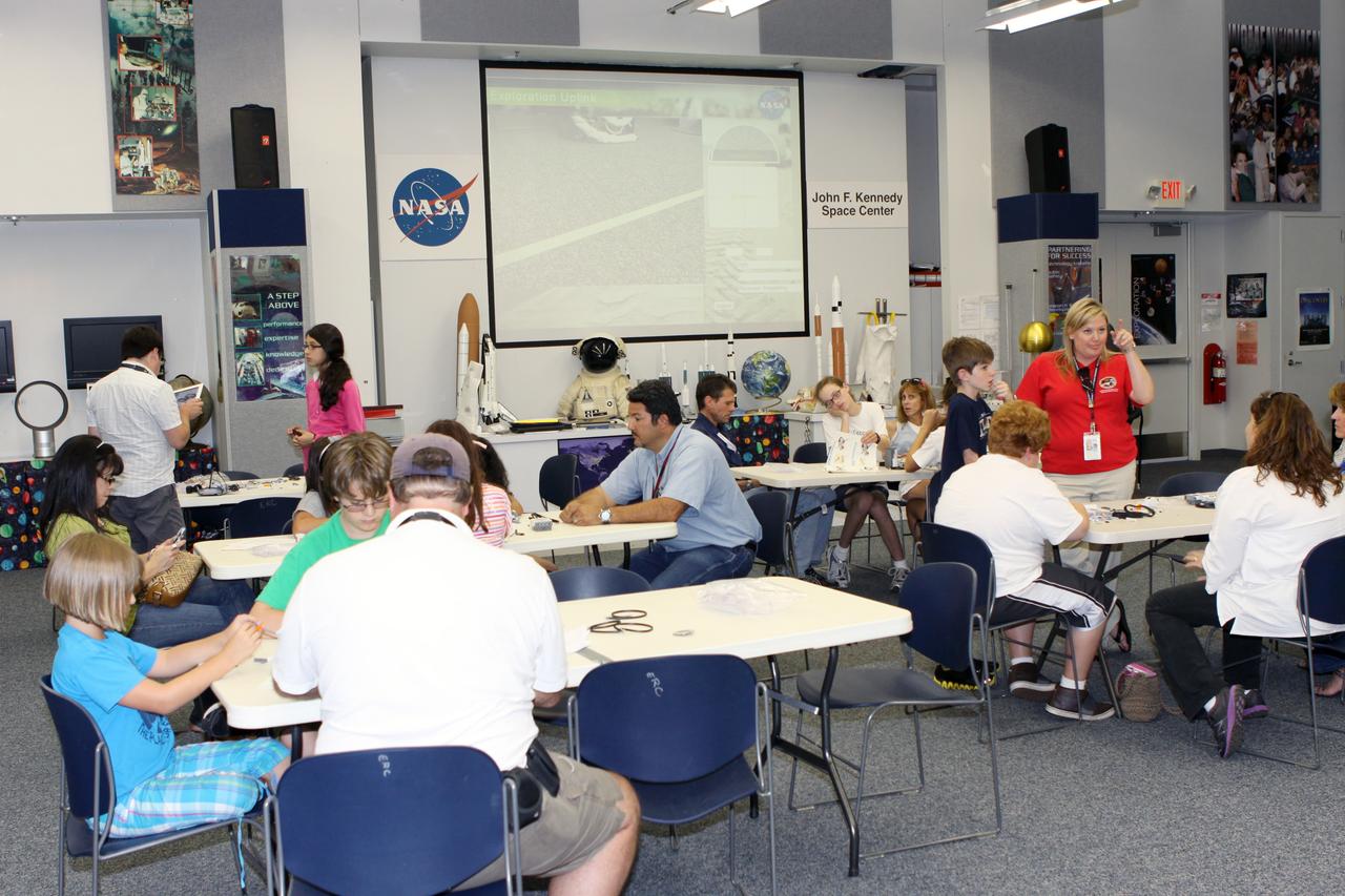 KSC Families build Lego Robots in Exploration Station