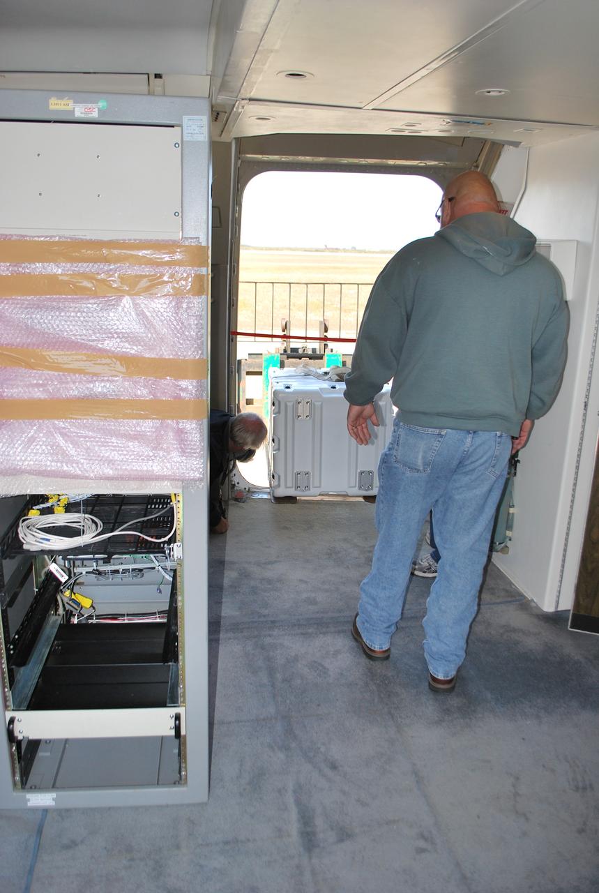 NUSTAR/Pegasus Hot Pad Activities, Racks Being Loaded