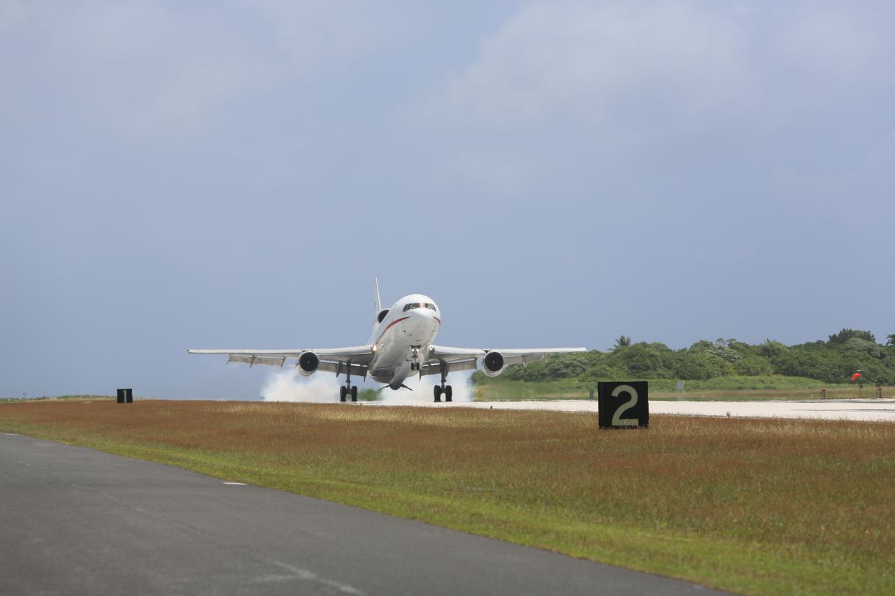 KWAJALEIN ATOLL, Marshall Islands – Orbital Sciences' L-1011 carrier aircraft touches down at the U.S. Army's Ronald Reagan Ballistic Missile Defense Test Site on Kwajalein Atoll, delivering Orbital’s Pegasus rocket and NASA’s Nuclear Spectroscopic Telescope Array, or NuSTAR, from Vandenberg Air Force Base in California.  The Pegasus, mated to its NuSTAR payload, will be launched from the carrier aircraft 117 nautical miles south of Kwajalein at latitude 6.75 degrees north of the equator.  The high-energy X-ray telescope will conduct a census of black holes, map radioactive material in young supernovae remnants, and study the origins of cosmic rays and the extreme physics around collapsed stars. Launch and deployment of the telescope is scheduled for June 13.  For more information, visit http:__www.nasa.gov_nustar.  Photo courtesy of Orbital Sciences Corp.