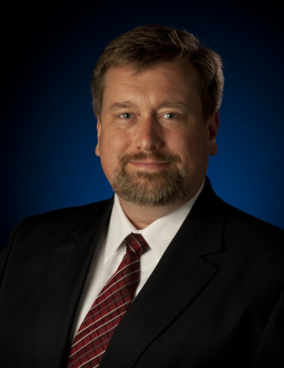 NASA Chief Technologist Mason Peck, official portrait, taken at NASA Headquarters on Wednesday, Jan. 11, 2012 in Washington.  Photo Credit: (NASA/Bill Ingalls)