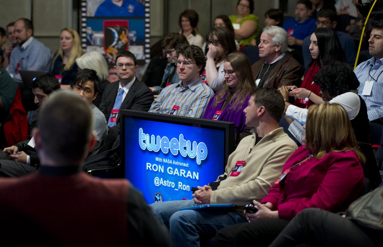 NASA Twitter followers are seen at a Tweetup hosted by NASA astronaut Ron Garan at NASA Headquarters in Washington, Tuesday, Feb. 14, 2012.  Garan was a flight engineer on both the Expedition 27 and 28 missions at the International Space Station.  Photo Credit:  (NASA/Carla Cioffi)