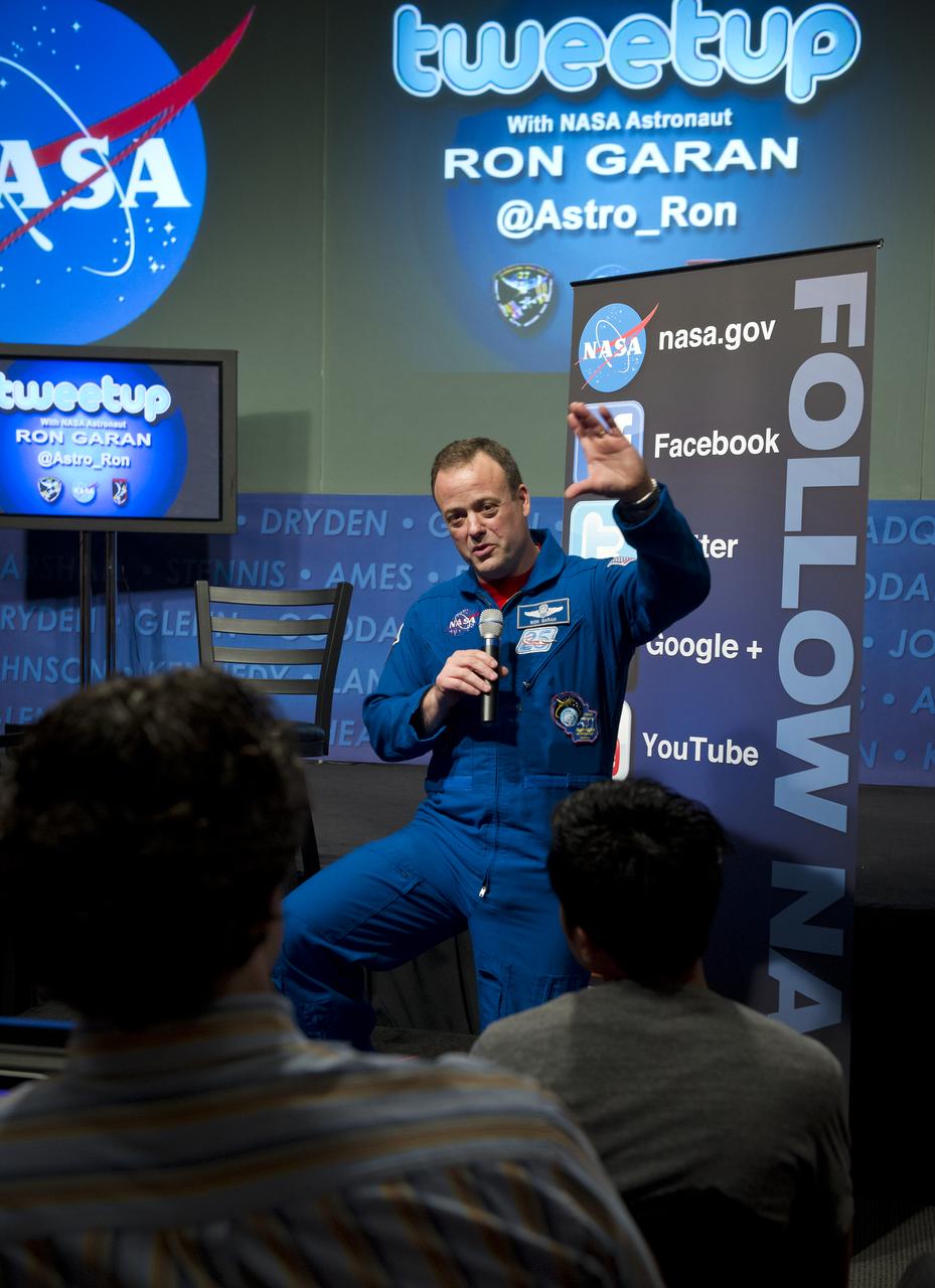 Astronaut Ron Garan discusses his experiences while living on the International Space Station as part of the Expedition 27 and 28 mission during a tweetup at NASA Headquarters in Washington, Tuesday, Feb. 14, 2012. Garan has logged more than 178 days in space and 27 hours and 3 minutes of EVA in four spacewalks. Photo Credit: (NASA/Carla Cioffi)