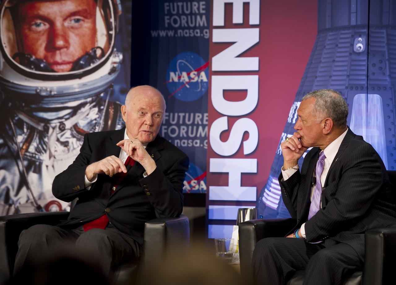 Sen. John Glenn, left, talks with NASA Administrator Charles Bolden during a NASA Future Forum panel discussion at The Ohio State University on Monday, Feb. 20, 2012, in Columbus, Ohio.  Monday marked the 50th anniversary of Glenn's historic flight as the first American to orbit Earth.  Photo Credit: (NASA/Bill Ingalls)