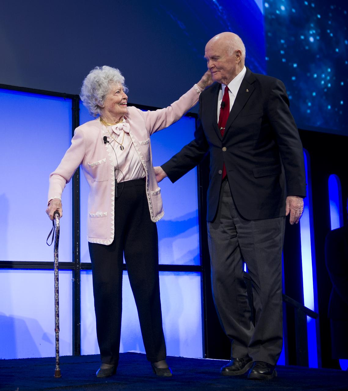 Sen. John Glenn and his wife Annie take the stage during a celebration dinner at The Ohio State University honoring the 50th anniversary of John Glenn's historic flight aboard Friendship 7 Monday, Feb. 20, 2012, in Columbus, Ohio. Glenn was the first American to orbit Earth.  Photo Credit: (NASA/Bill Ingalls)
