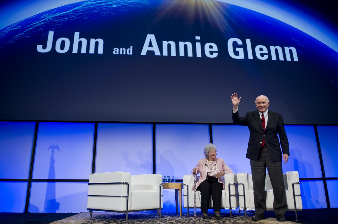 Sen. John Glenn and his wife Annie take the stage during a celebration dinner at The Ohio State University honoring the 50th anniversary of John Glenn's historic flight aboard Friendship 7 Monday, Feb. 20, 2012, in Columbus, Ohio. Glenn was the first American to orbit Earth.  Photo Credit: (NASA/Bill Ingalls)
