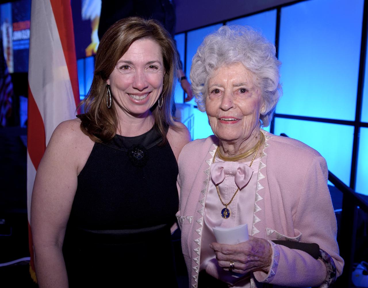 Sen. John Glenn's wife Annie, right, and NASA Deputy Administrator Lori Garver pose for a photograph during a celebration dinner at Ohio State University honoring the 50th anniversary of John Glenn's historic flight aboard Friendship 7 Monday, Feb. 20, 2012, in Columbus, Ohio. Glenn was the first American to orbit Earth.  Photo Credit: (NASA/Bill Ingalls)