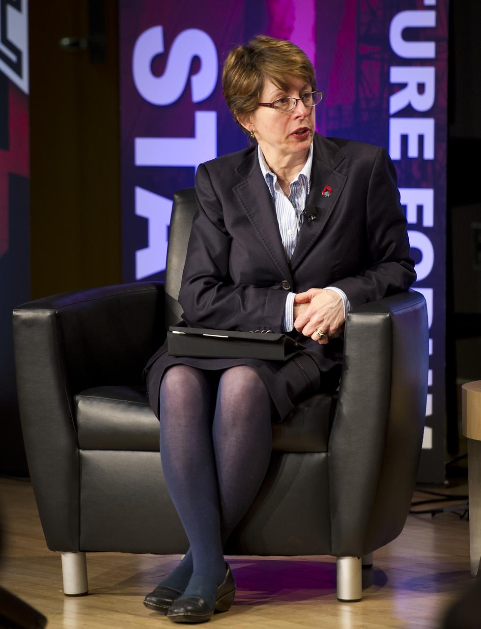 Dr. Caroline Wagner, associate professor, Ambassador Milton A. and Roslyn Z. Wolf Chair in International Affairs, and Director, Battelle Center for Science and Technology Policy, The Ohio State University moderates the NASA Future Forum panel titled "Shifting Roles for Public, Private, and International Players in Space" at The Ohio State University on Tuesday, Feb. 21, 2012 in Columbus, Ohio. The NASA Future Forum features panel discussions on the importance of education to our nation's future in space, the benefit of commercialized space technology to our economy and lives here on Earth, and the shifting roles for the public, commercial and international communities in space. Photo Credit: (NASA/Bill Ingalls)