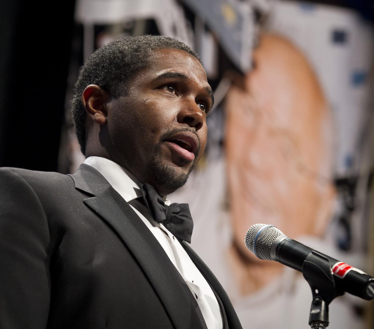 Cleveland State University Master of Music Major James Binion Jr. sings a musical tribute during an event celebrating John Glenn's legacy and 50 years of americans in orbit held at the university's Wolstein Center on Friday, March 3, 2012 in Cleveland, Ohio.  In 1998 Lindsey flew onboard the space shuttle Discovery along with then 77 year-old Sen. John Glenn for the STS-95 mission.  Glenn became the first American to orbit Earth in 1962.  Photo Credit: (NASA/Bill Ingalls)