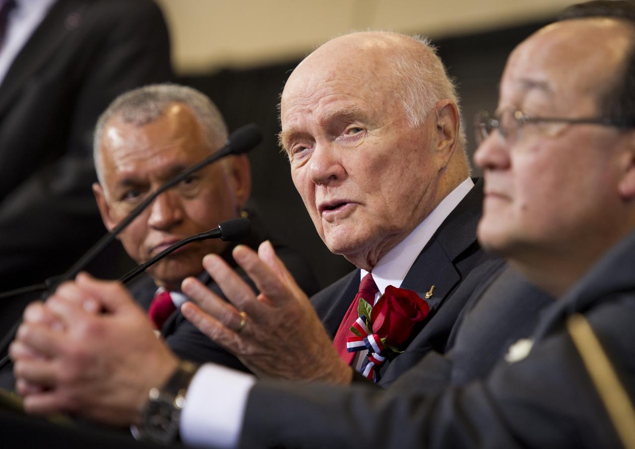 Sen. John Glenn answers questions as NASA Administrator Charles Bolden, left, and NASA Glenn Research Center Ray Lugo look on at a NASA Tweetup event celebrating Glenn's legacy and 50 years of americans in orbit held at the Cleveland State University Wolstein Center on Friday, March 3, 2012 in Cleveland, Ohio. Glenn became the first American to orbit Earth in 1962.  Photo Credit: (NASA/Bill Ingalls)