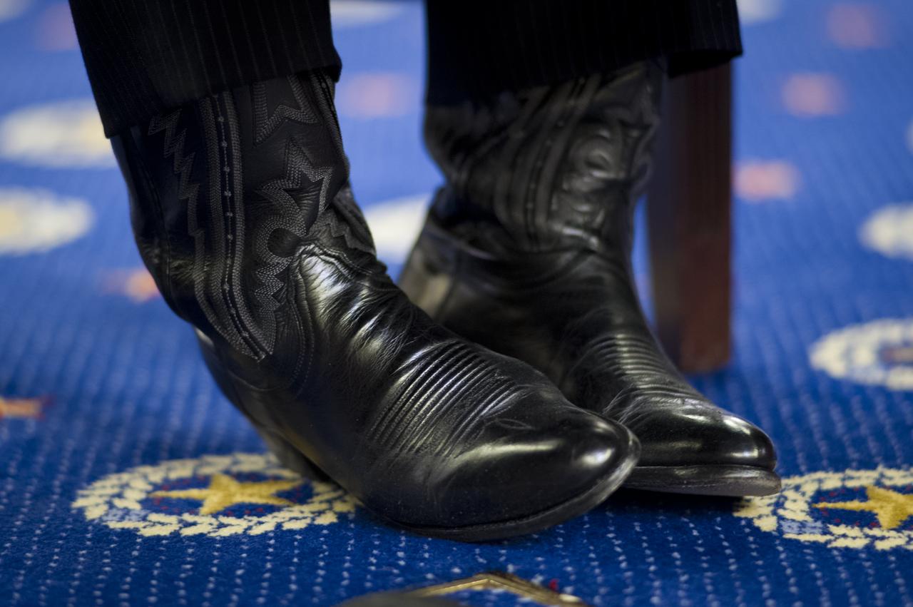 NASA Administrator Charles Bolden's cowboy boots are seen as he testifies during a U.S. Senate Committee on Commerce, Science, and Transportation hearing on Wednesday, March 7, 2012 in Washington. Photo Credit: (NASA/Bill Ingalls)