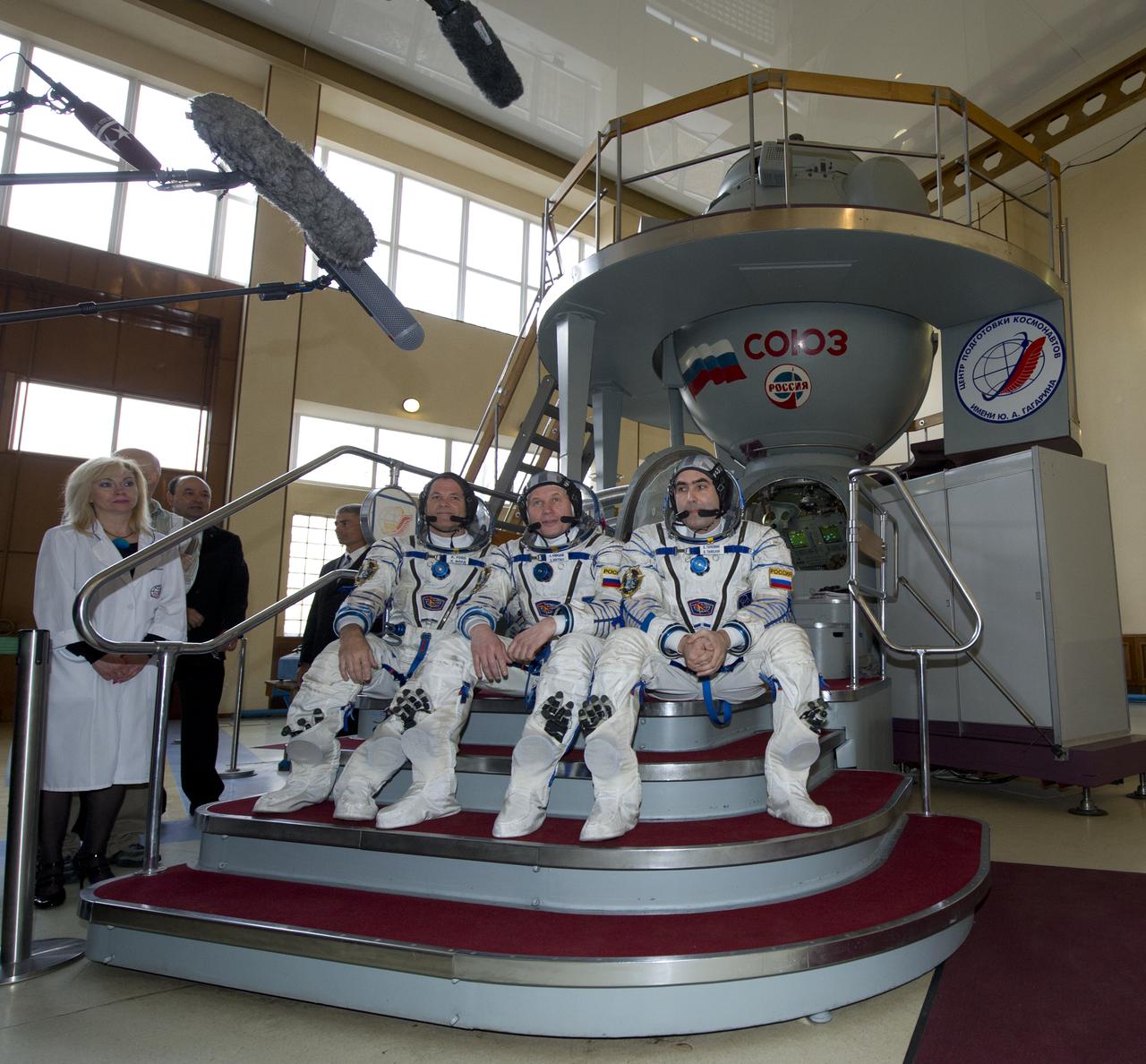 Expedition 31 backup crew members Kevin Ford (left), Oleg Novitskiy and Evgeny Tarelkin (right) are interviewed by the press before their final qualification test in preparation for flight, Monday, April 23, 2012 at the Gagarin Cosmonaut Training Center in Star City, Russia.   Expedition 31 prime crew members commander Gennady Padalka, flight engineers Joe Acaba and Sergei Revin practiced similar scenarios nearby in advance of their final approval for launch to the International Space Station, scheduled for May 15, 2012.  Photo Credit:  (NASA/Carla Cioffi)