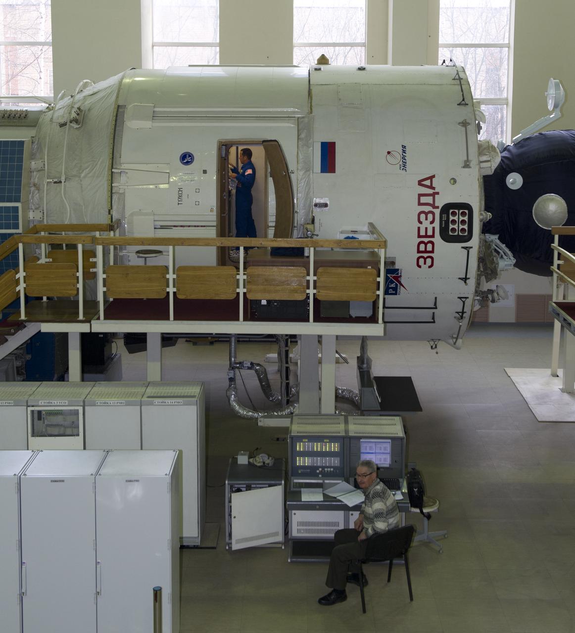 NASA flight engineer Joe Acaba is seen training in a mockup of the International Space Station Zvezda service module, Monday, April 23, 2012 at the Gagarin Cosmonaut Training Center in Star City, Russia.  Acaba, Soyuz commander Gennady Padalk and flight engineer Sergei Revin are set to launch May 15 from the Baikonur Cosmodrome in their Soyuz TMA-04M spacecraft to the International Space Station.  Photo Credit:  (NASA/Carla Cioffi)