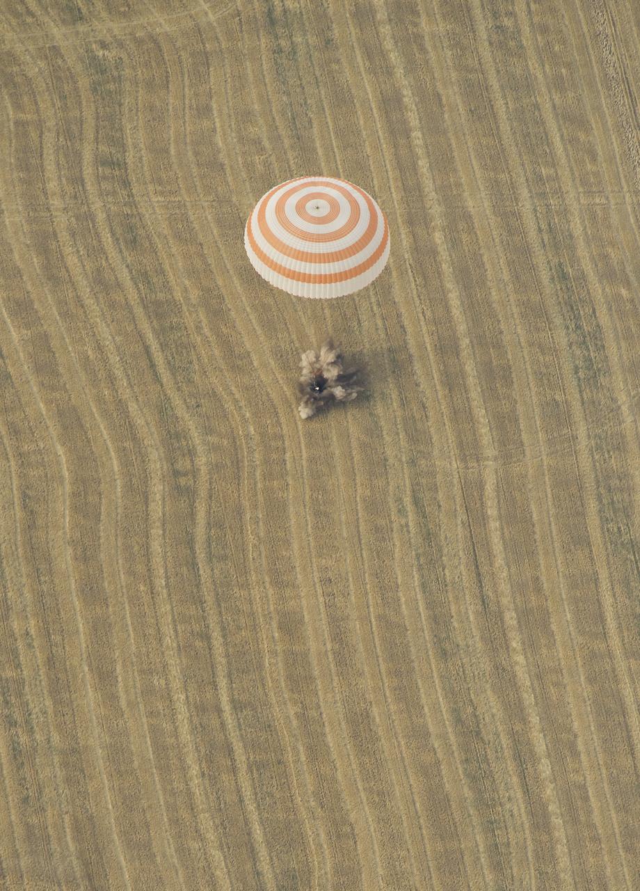 The Soyuz TMA-22 spacecraft is seen as it lands with Expedition 30 Commander Dan Burbank, and Flight Engineers Anton Shkaplerov and Anatoly Ivanishin in a remote area outside of the town of Arkalyk, Kazakhstan, on Friday, April 27, 2012. NASA Astronaut Burbank, Russian Cosmonauts Shkaplerov and Ivanishin are returning from more than five months onboard the International Space Station where they served as members of the Expedition 29 and 30 crews. Photo Credit: (NASA/Carla Cioffi)