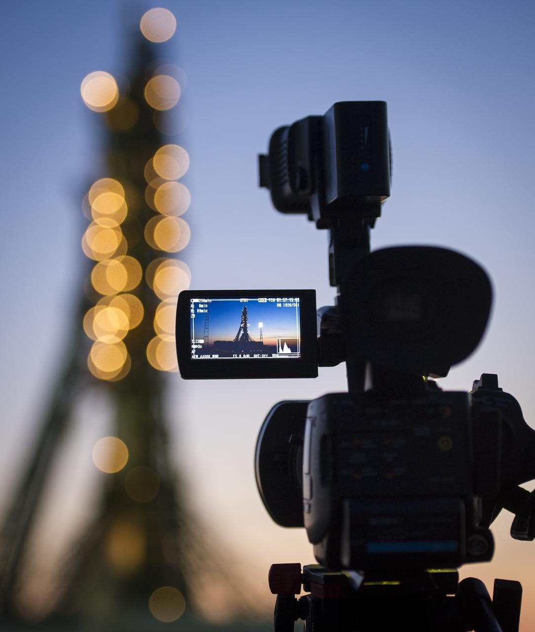 The Soyuz rocket is seen in the monitor of a video camera moments before Expedition 31 Soyuz Commander Gennady Pedalka, NASA Flight Engineer Joseph Acaba and Flight Engineer Sergei Revin arrive to board the rocket at the Baikonur Cosmodrome in Kazakhstan, Tuesday, May 15, 2012.  The launch of the Soyuz spacecraft with Padalka, Revin, and Acaba is scheduled for 9:01 a.m. local time on Tuesday, May 15.  Photo Credit (NASA/Bill Ingalls)