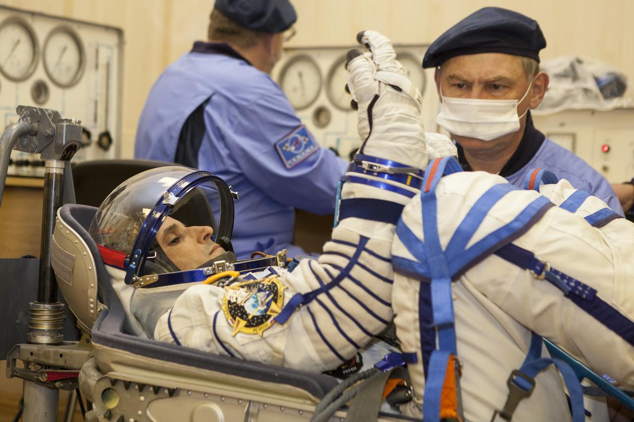 Flight Engineer Joe Acaba has his Russian Sokol suit pressure checked in preparation for his launch onboard the Soyuz TMA-04M on Tuesday, May 15, 2012 at the Baikonur Cosmodrome in Kazakhstan. The Soyuz spacecraft with Acaba, Expedition 31 Soyuz Commander Gennady Padalka, and Flight Engineer Sergei Revin onboard, launched at 9:01 a.m. Kazakhstan time on Tuesday, May 15.  Photo Credit: (NASA/GCTC/Andrey Shelepin)
