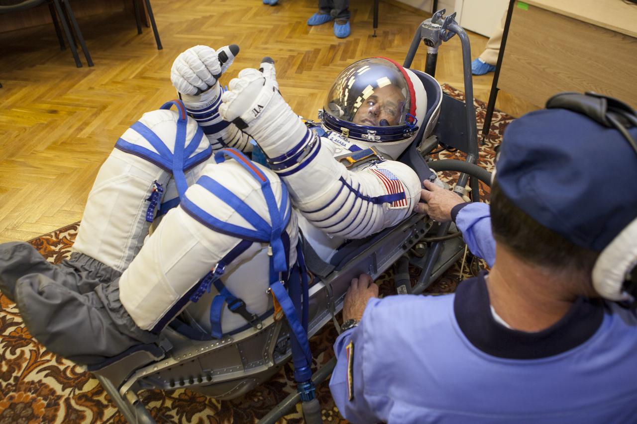 Flight Engineer Joe Acaba has his Russian Sokol suit pressure checked in preparation for his launch onboard the Soyuz TMA-04M on Tuesday, May 15, 2012 at the Baikonur Cosmodrome in Kazakhstan. The Soyuz spacecraft with Acaba, Expedition 31 Soyuz Commander Gennady Padalka, and Flight Engineer Sergei Revin onboard, launched at 9:01 a.m. Kazakhstan time on Tuesday, May 15.  Photo Credit: (NASA/GCTC/Andrey Shelepin)